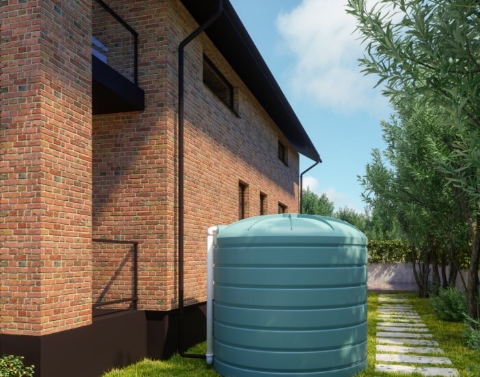 Seamless gutter in front of a water tank in Snohomish or King County