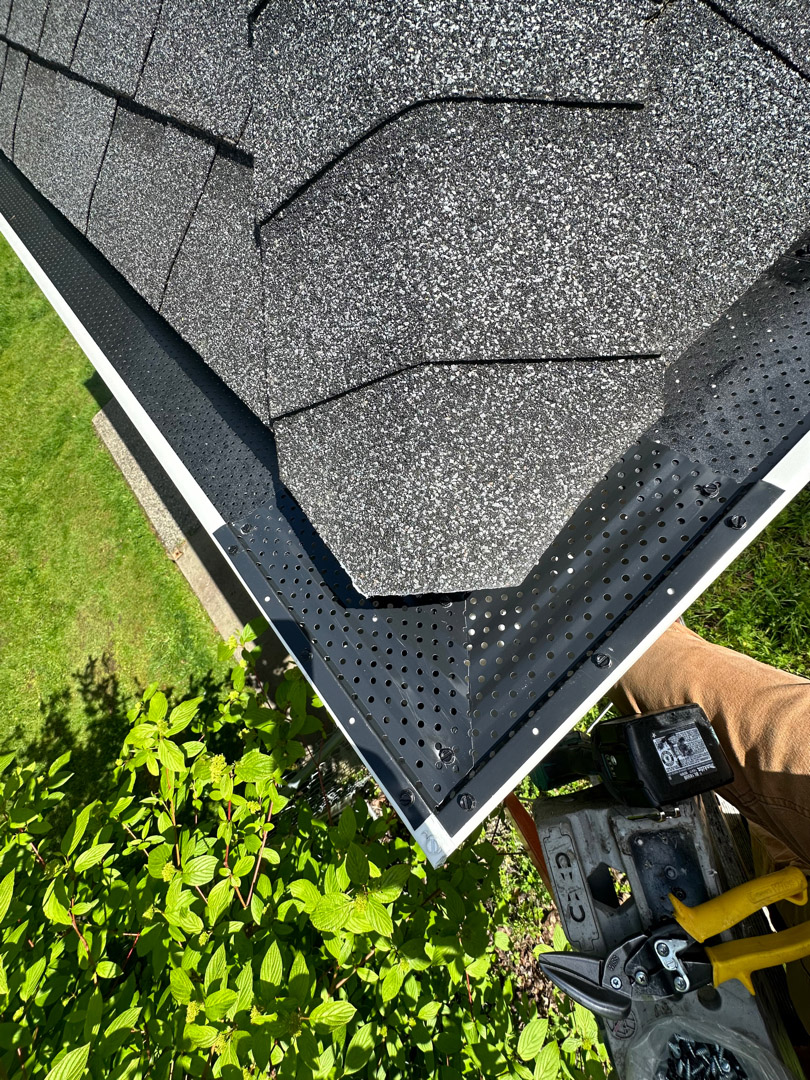 High Point Gutter crew installing T-Rex Gutter Covers