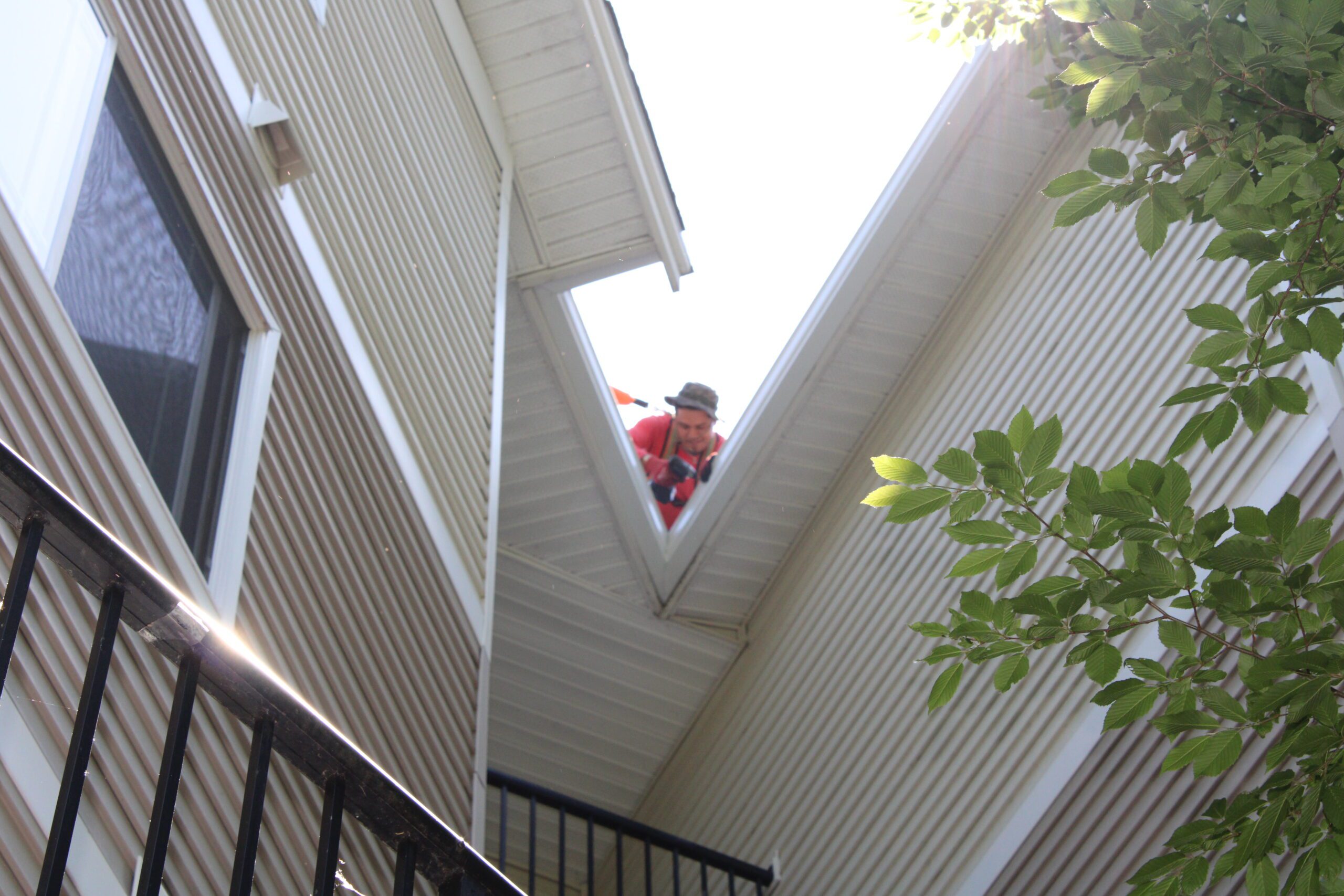 High Point Gutter technician on a gutter repair