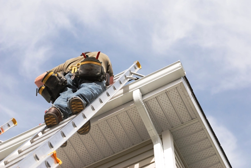 High Point Gutter specialist working on a home in Snohomish, WA