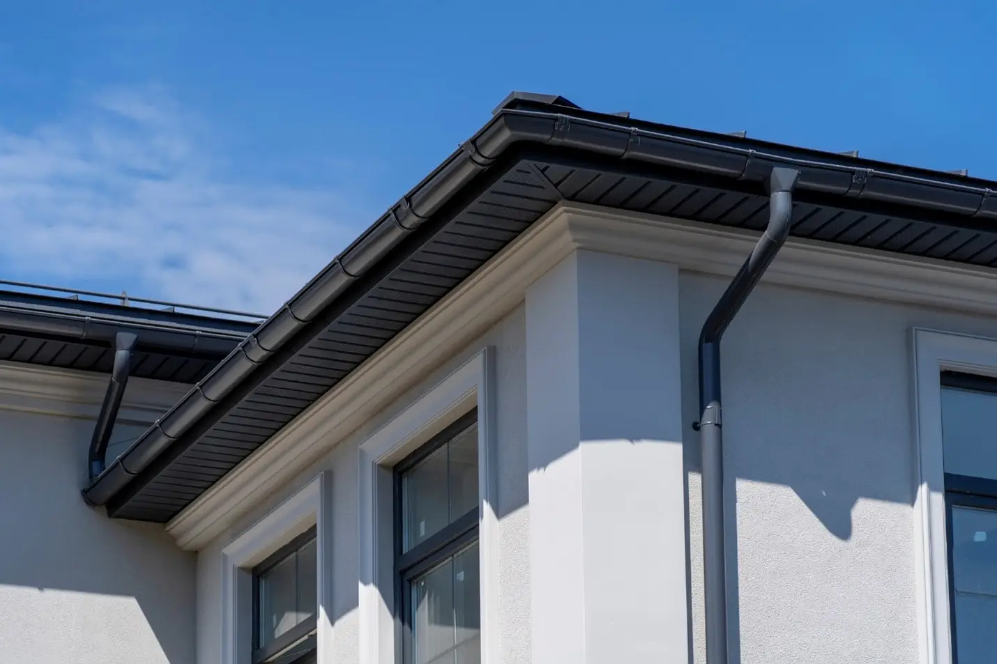 Durable black gutters on a modern home in Seattle, WA
